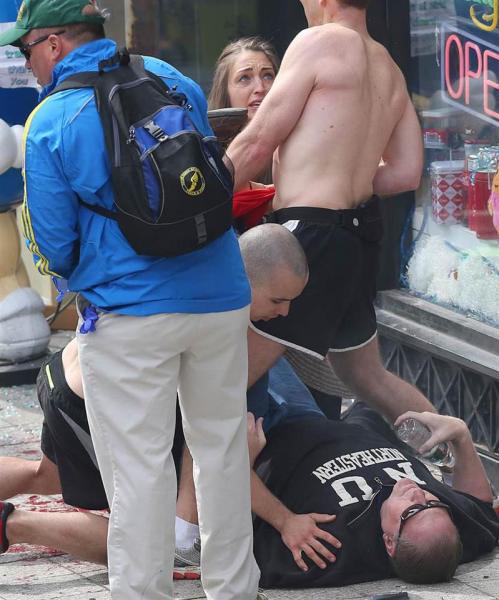 A picture of Team RWB in action today in Boston, taking his shirt off to provide first aid to the injured. We are posting these pictures & videos as they come in because we feel it’s important to remind one another of the positive things happening amid the chaos and the evil. We must focus on the positive and keep praying for those killed today, those injured, their families….the first responders and the medical personnel working right now to save lives and limbs. It’s not easy to focus on the positive right now, but here is an example of selfless service that we can all look to for hope and inspiration. — with Sydney Caine Freeman.