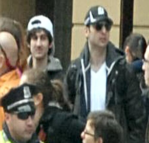 Suspects together in crowd 